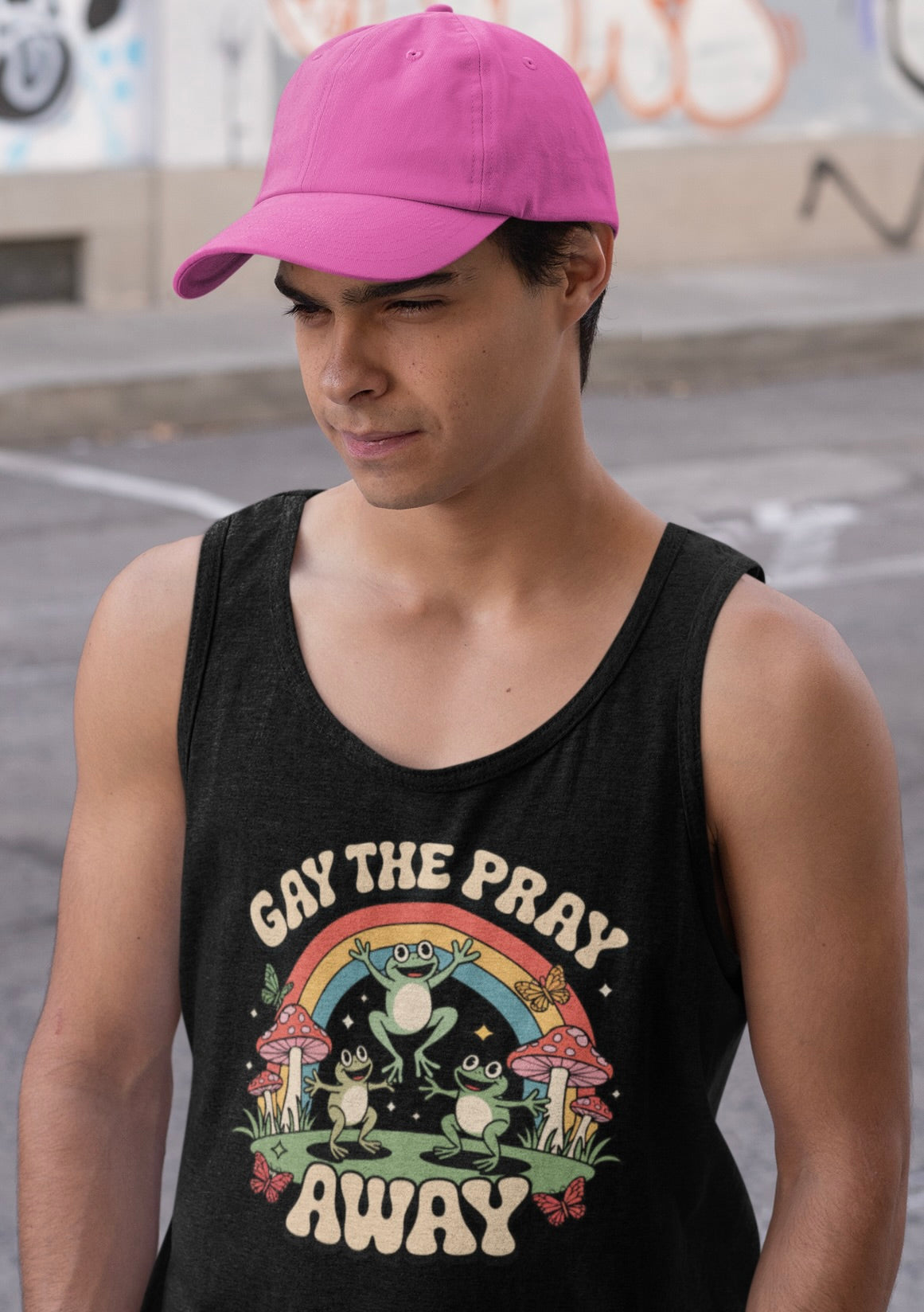 Make a statement and a splash with our “Gay the Pray Away” Pride Tank Top!