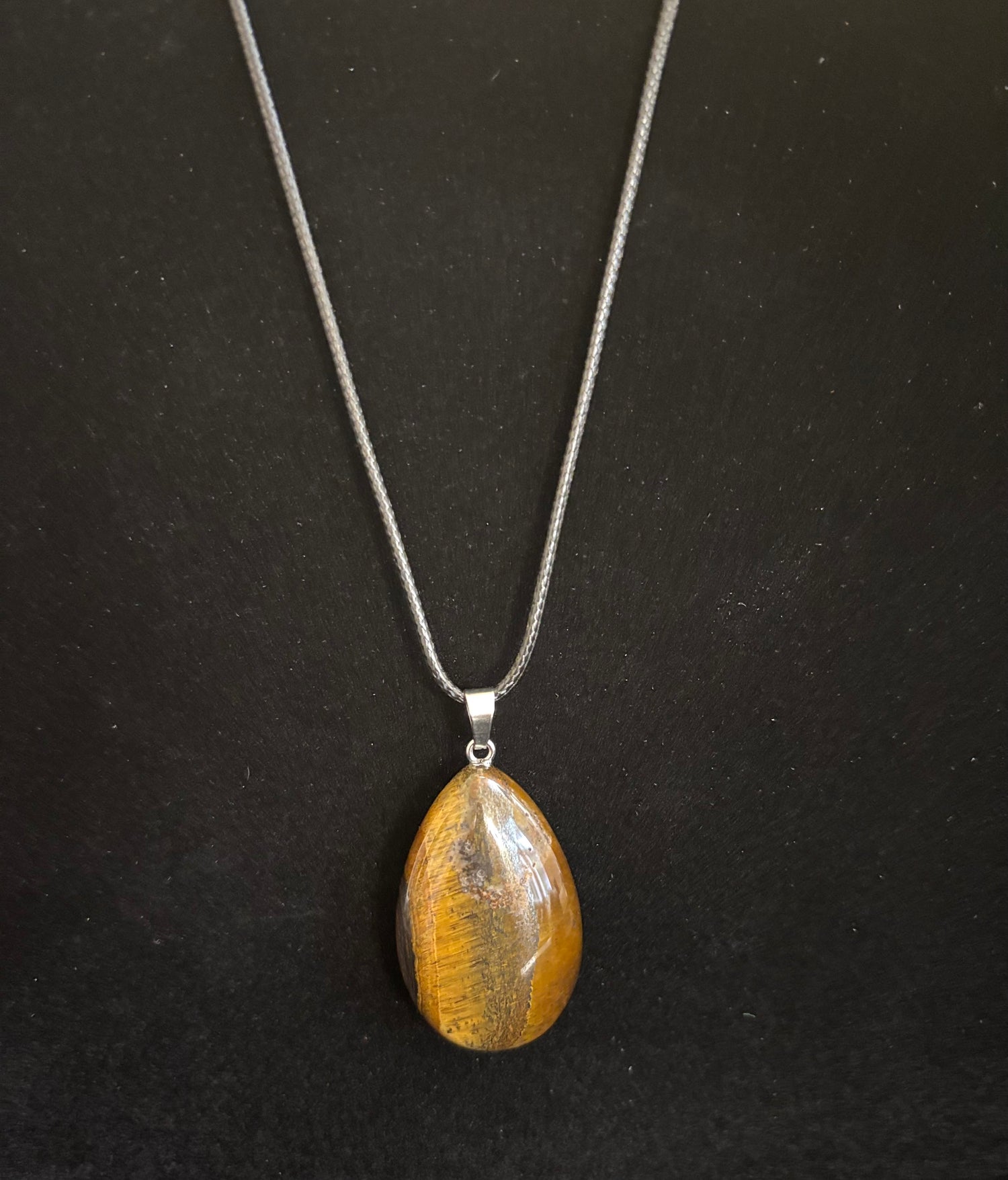 Grounded Elegance: Natural Tiger Eye Leather Pendant Necklace on Leather Rope