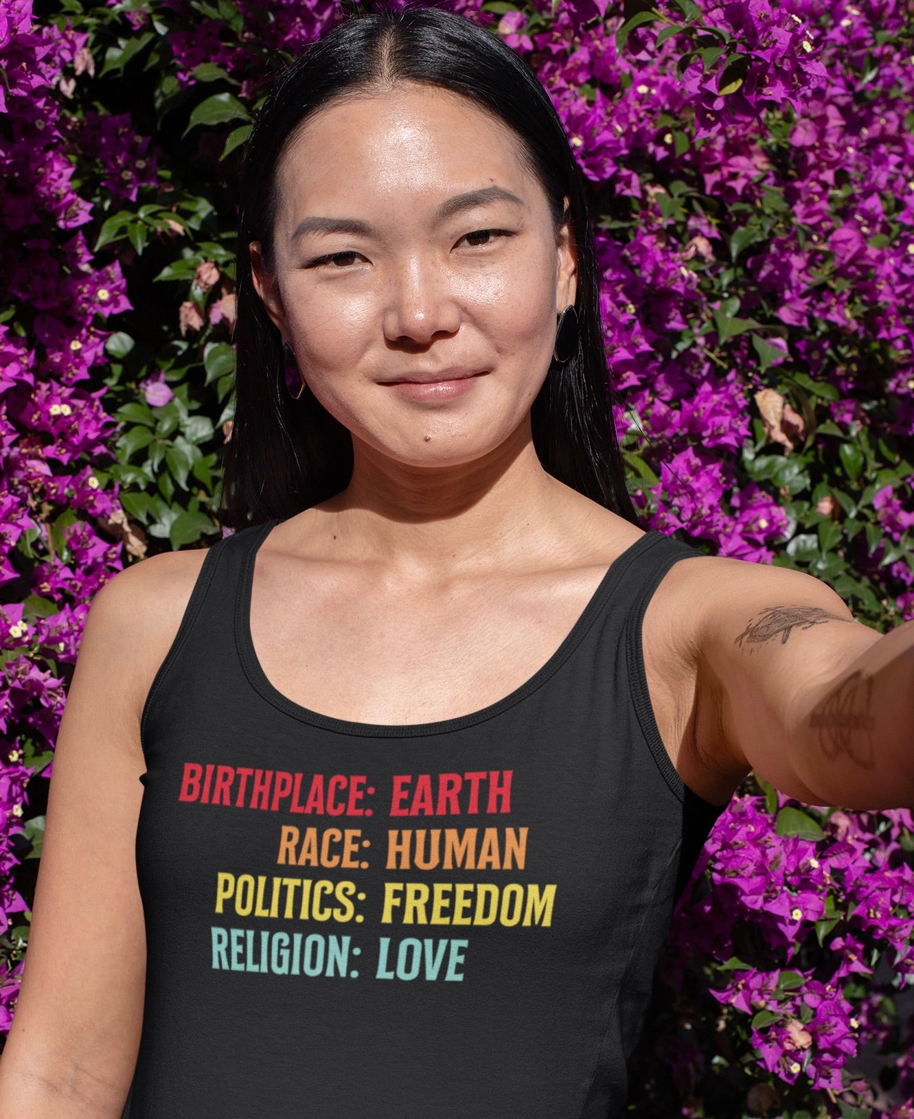 Stay cool and conscious in our “Birthplace: Earth” Unisex Tank Top